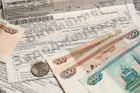 Можно ли покупать недвижимость с долгами по коммуналке?